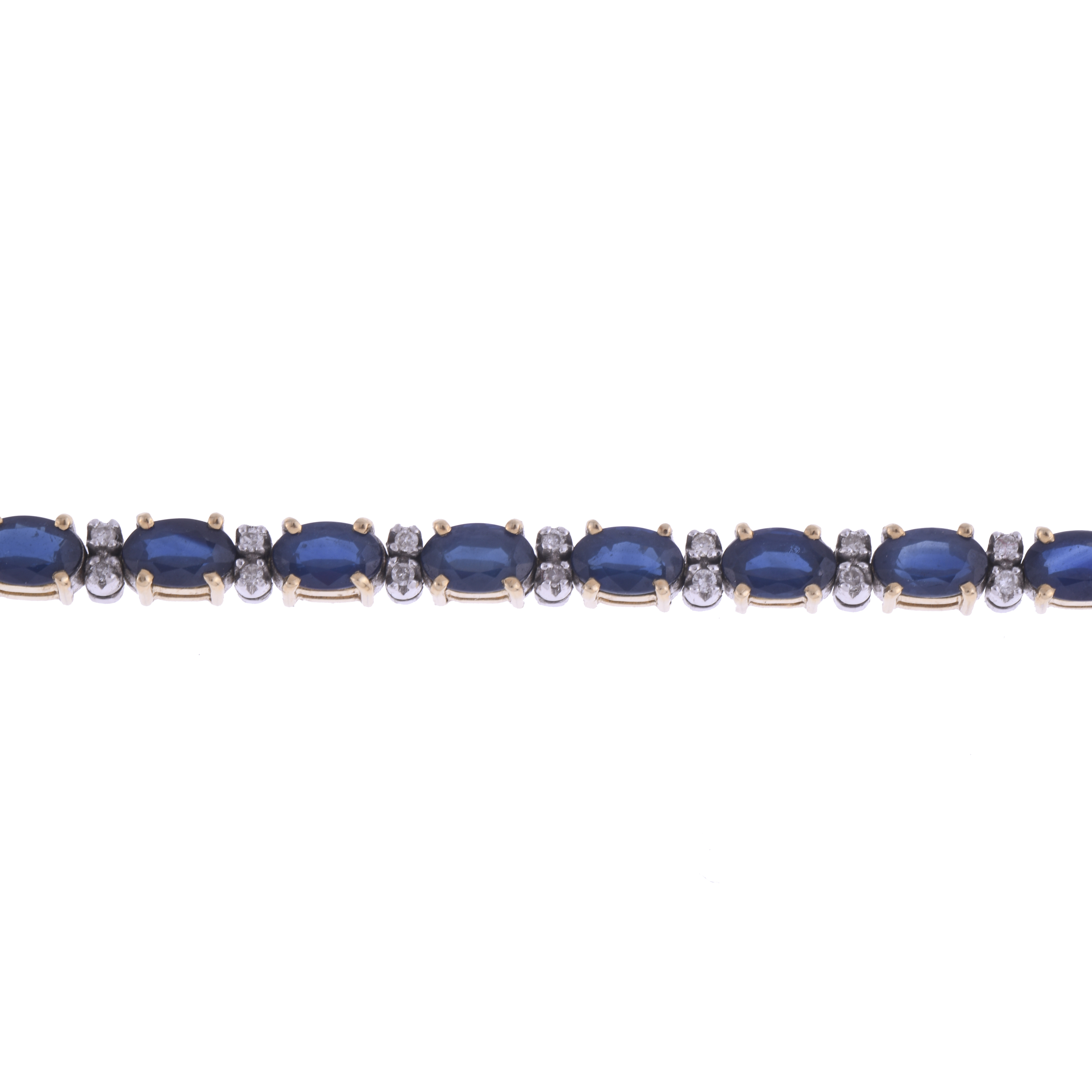 RIVIÈRE BRACELET WITH SAPPHIRES AND DIAMONDS.