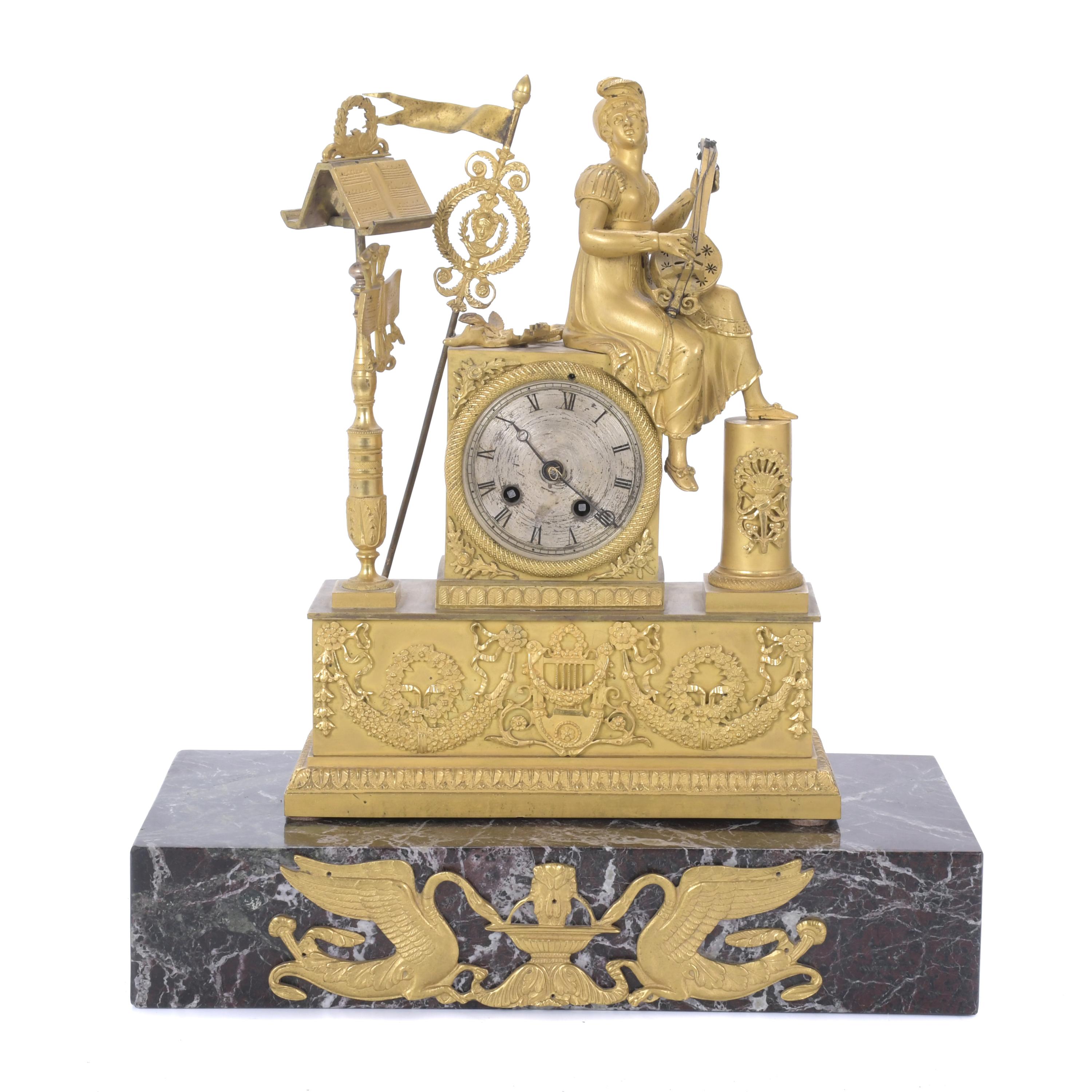 EMPIRE TABLE CLOCK WITH ALLEGORY OF MUSIC, S. XIX.