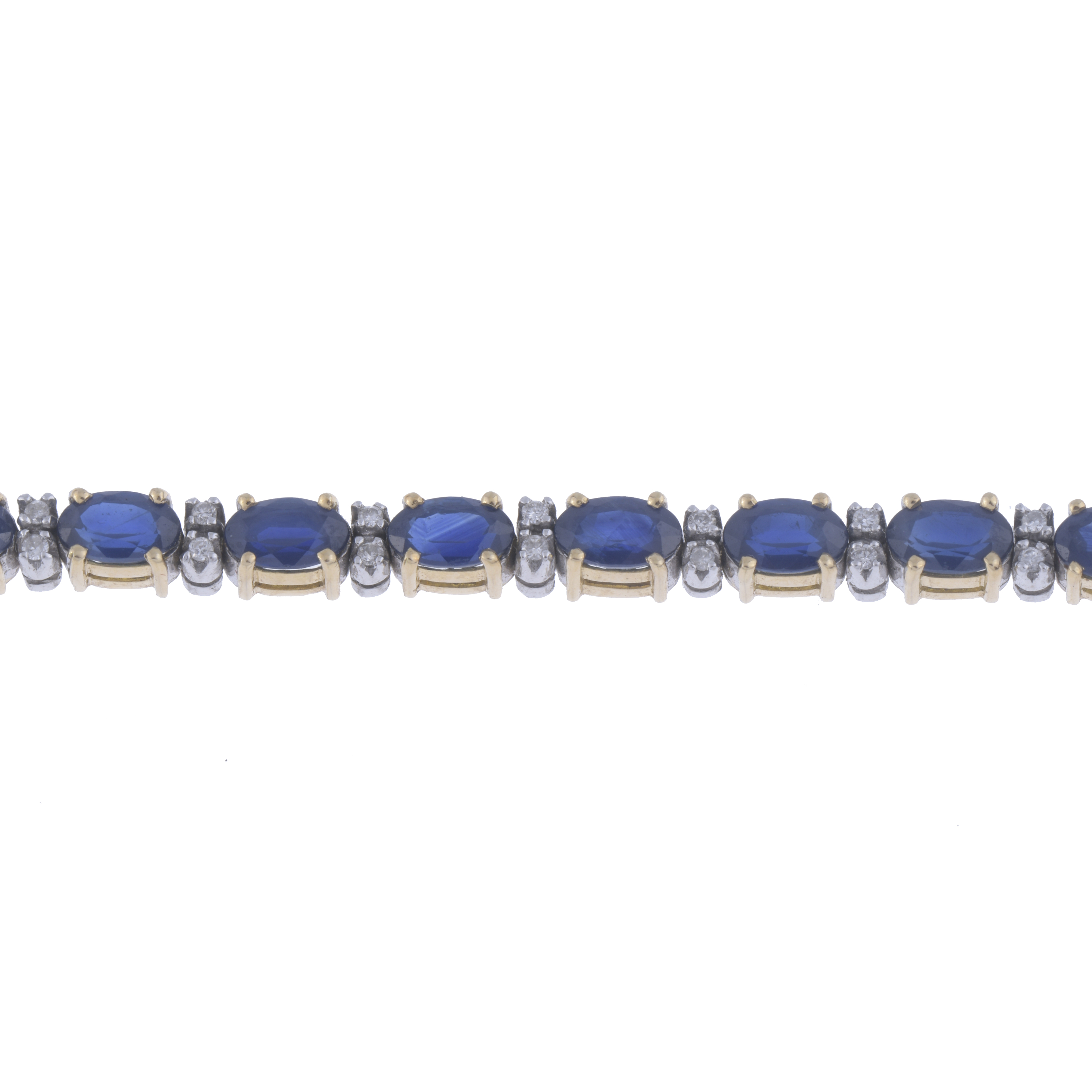 PULSERA RIVIÈRE CON ZAFIROS Y DIAMANTES.