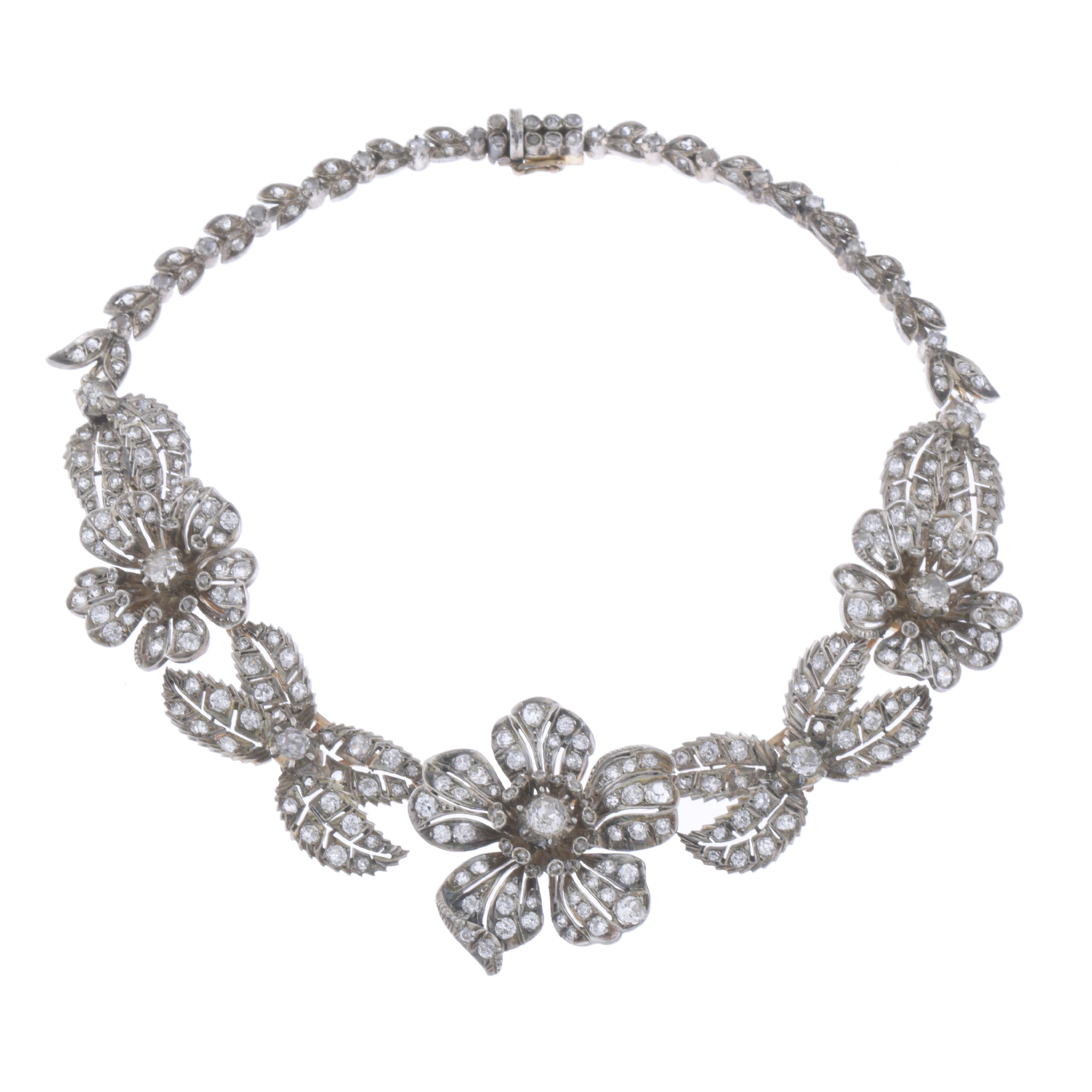 ATTR. TO MELLERIO, CIRCA 1905. TRANSFORMABLE FLORAL CHOKER.