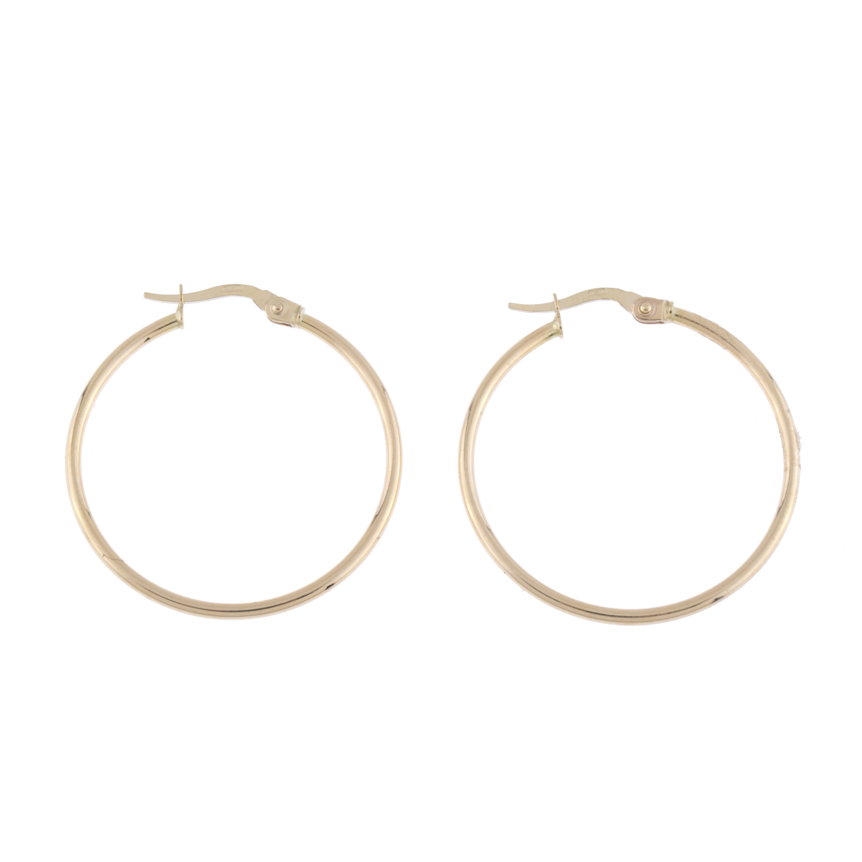 Gold creole earrings.