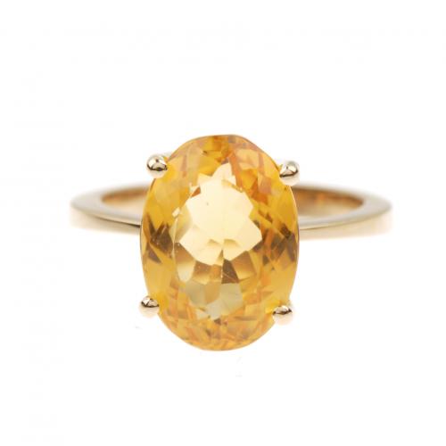 Oro con citrino de talla oval de 8,79 ct. Montura realizada a mano. 17,5 mm. 6 gr.