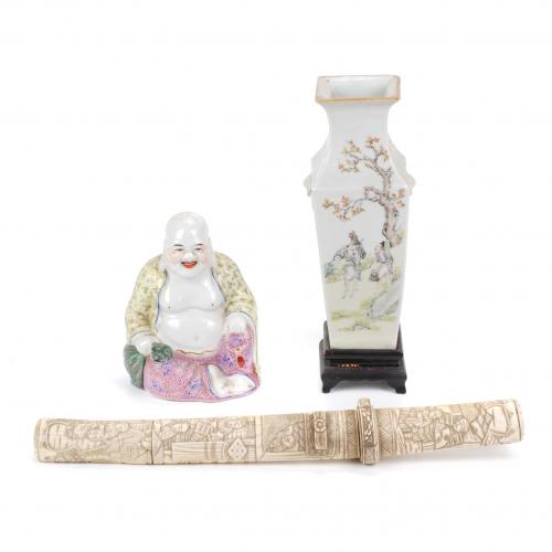 Chinese porcelain vase, Chinese porcelain Buddha with polychrome decoration and Japanese decorative dagger in carved bone. Buddha 15 cm H, vase with wooden stand 23.5 cm, dagger 38 cm long.