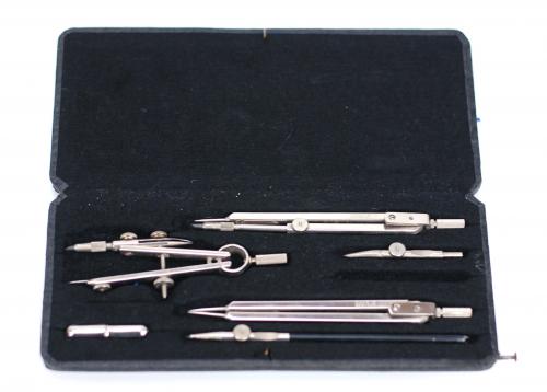 THREE SETS OF GERMAN COMPASSES AND FOUNTAIN PENS. FIRST HAL