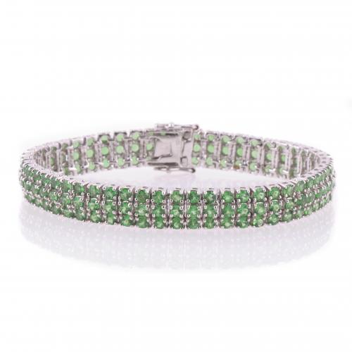 WHITE GOLD AND TSAVORITE GARNETS BRACELET.