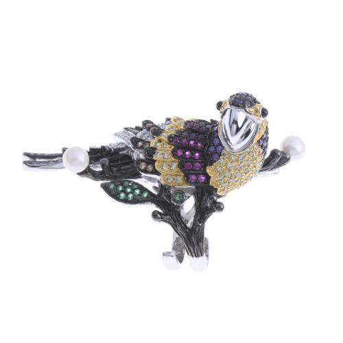 PARROT-SHAPED RING IN SILVER WITH COLOURED BEADS.