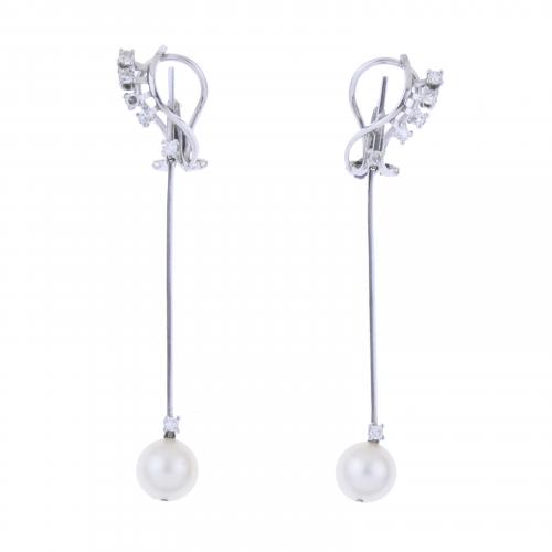 LONG EARRINGS IN WHITE GOLD, DIAMONDS AND PEARLS.