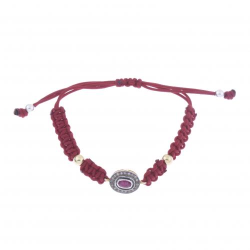 RED THREAD BRACELET WITH RUBY AND DIAMONDS.