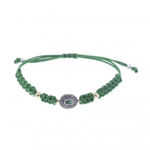 THREAD BRACELET WITH EMERALD AND DIAMONDS.