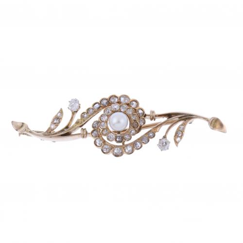 BROCHE FLORAL CON DIAMANTES Y PERLA.