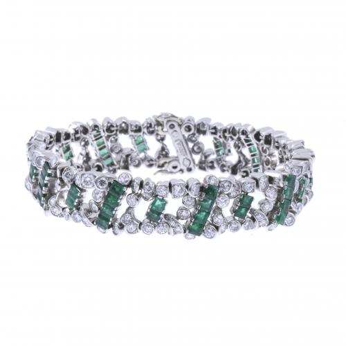 J. ROCA. PULSERA CON DIAMANTES Y ESMERALDAS.