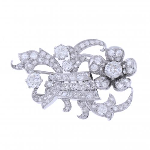 BROCHE-CLIP FLORAL DE DIAMANTES.