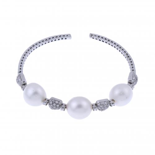 DIAMONDS AND PEARLS RIGID BRACELET.