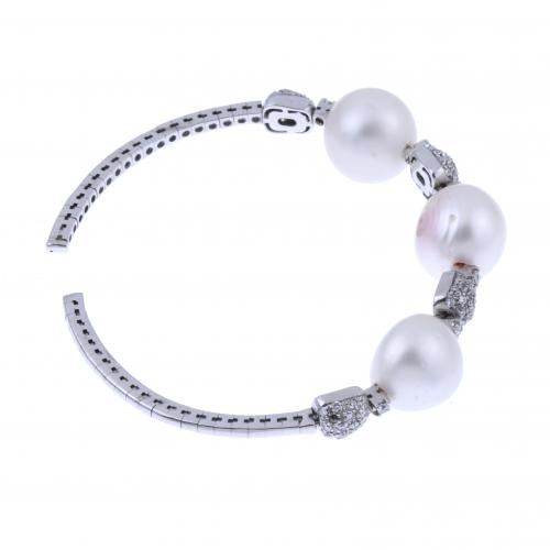 DIAMONDS AND PEARLS RIGID BRACELET.