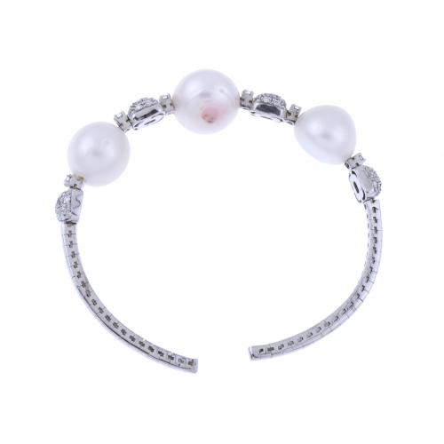 DIAMONDS AND PEARLS RIGID BRACELET.