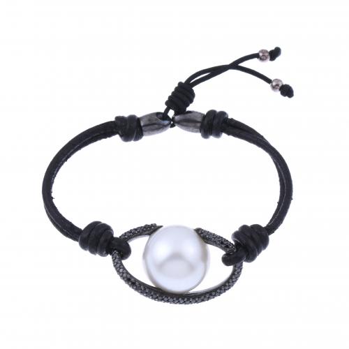 PULSERA  CON DIAMANTES NEGROS Y PERLA AUSTRALIANA.