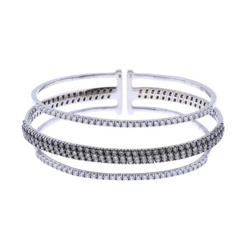 TRIPLE BRAZALETE RÍGIDO DE DIAMANTES.