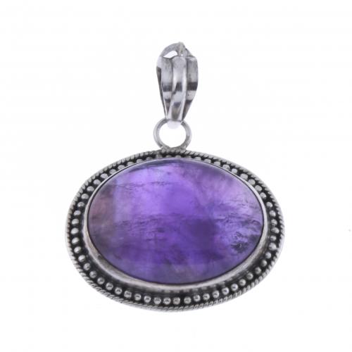 PENDANT WITH A NATURAL AMETHYST.