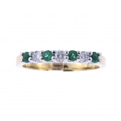 DIAMONDS AND EMERALDS BAND RING.