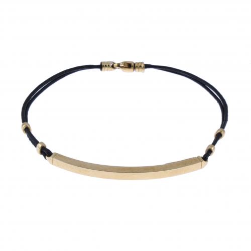 PULSERA CON PLACA EN ORO.