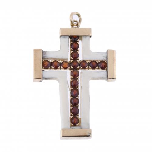 BONE AND GARNET CROSS PENDANT.