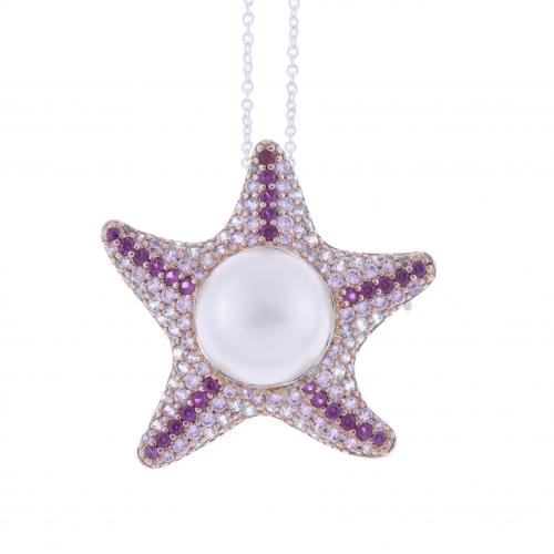 COLGANTE-BROCHE ESTRELLA DE MAR.