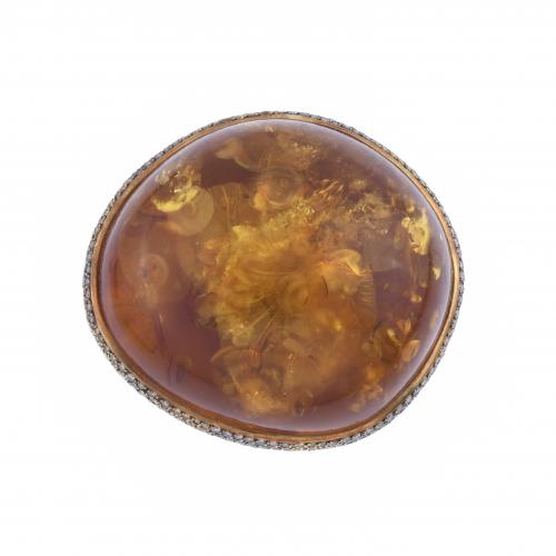 LARGE RING WITH AMBER.