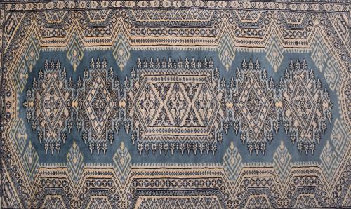 IRANIAN OCHRE AND BLUE CARPET, 20TH CENTURY. 