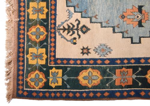 IRANIAN BLUE-GREEN AND BEIGE CARPET, 20TH CENTURY. 