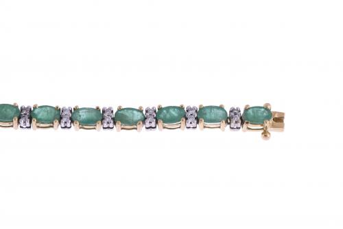 EMERALDS AND DIAMONDS RIVIÈRE BRACELET.