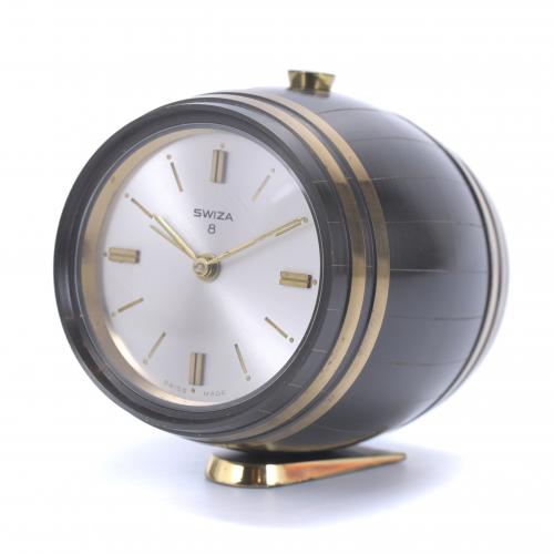 SWIZA. TABLE CLOCK IN THE SHAPE OF A BARREL.