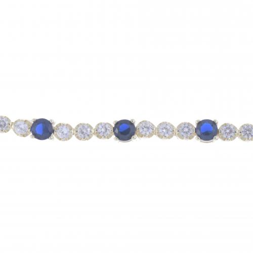 RIVIÈRE BRACELET WITH GEMSTONES AND ZIRCONS.