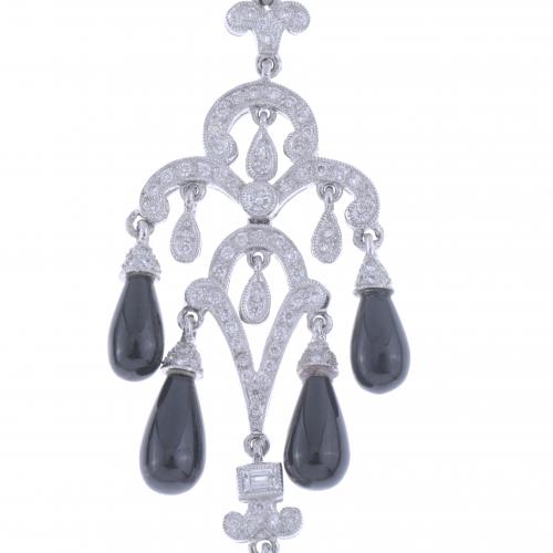 GIRANDOLE EARRINGS WITH DIAMONDS AND ONYX.