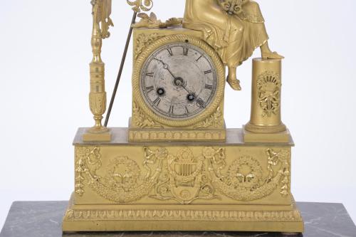 EMPIRE TABLE CLOCK WITH ALLEGORY OF MUSIC, S. XIX.