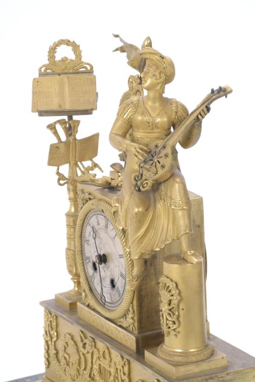 EMPIRE TABLE CLOCK WITH ALLEGORY OF MUSIC, S. XIX.