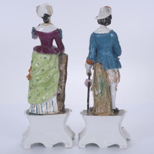 Pareja de figuras en porcelana Napoleón III, siglo XIX. 