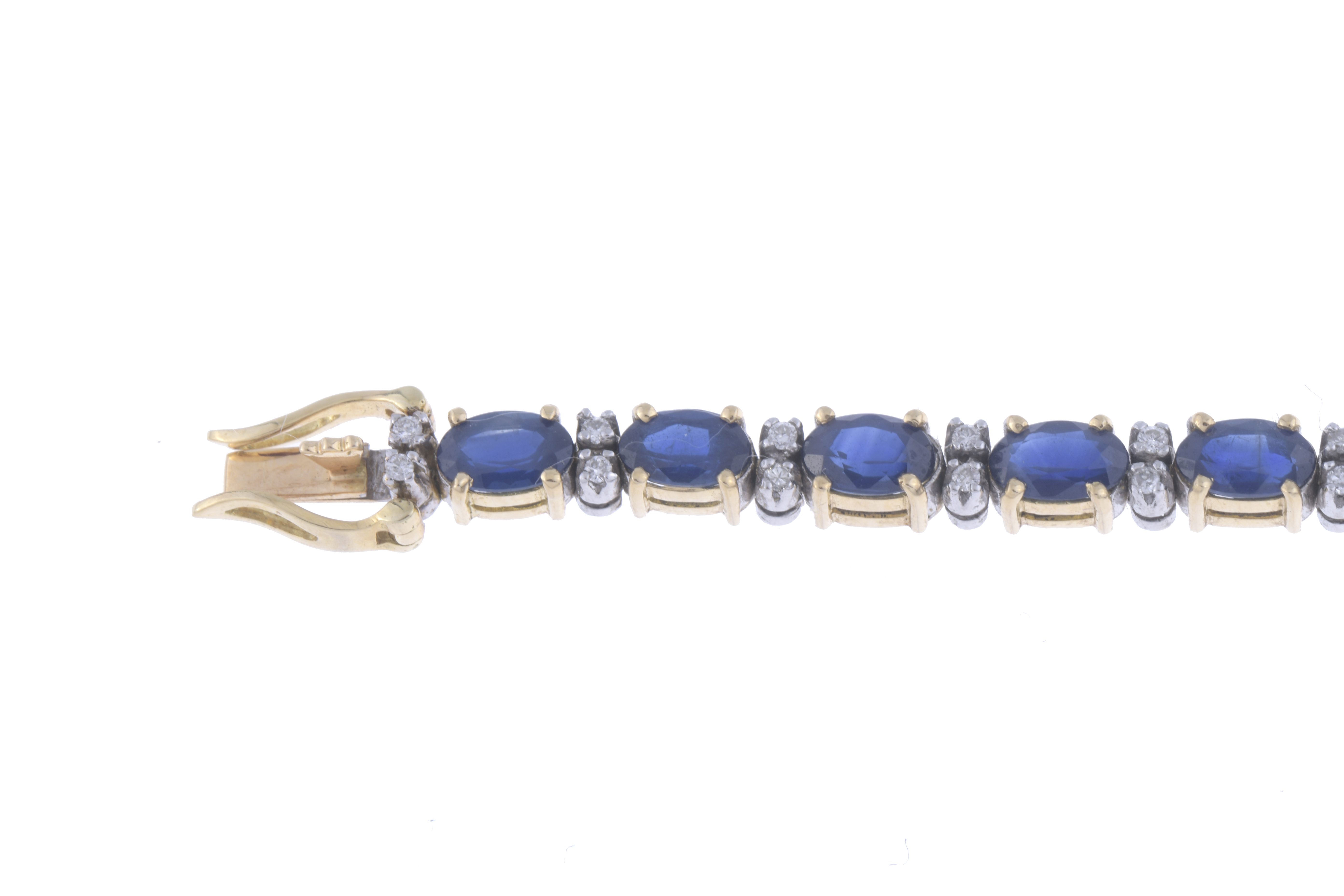 PULSERA RIVIÈRE CON ZAFIROS Y DIAMANTES.