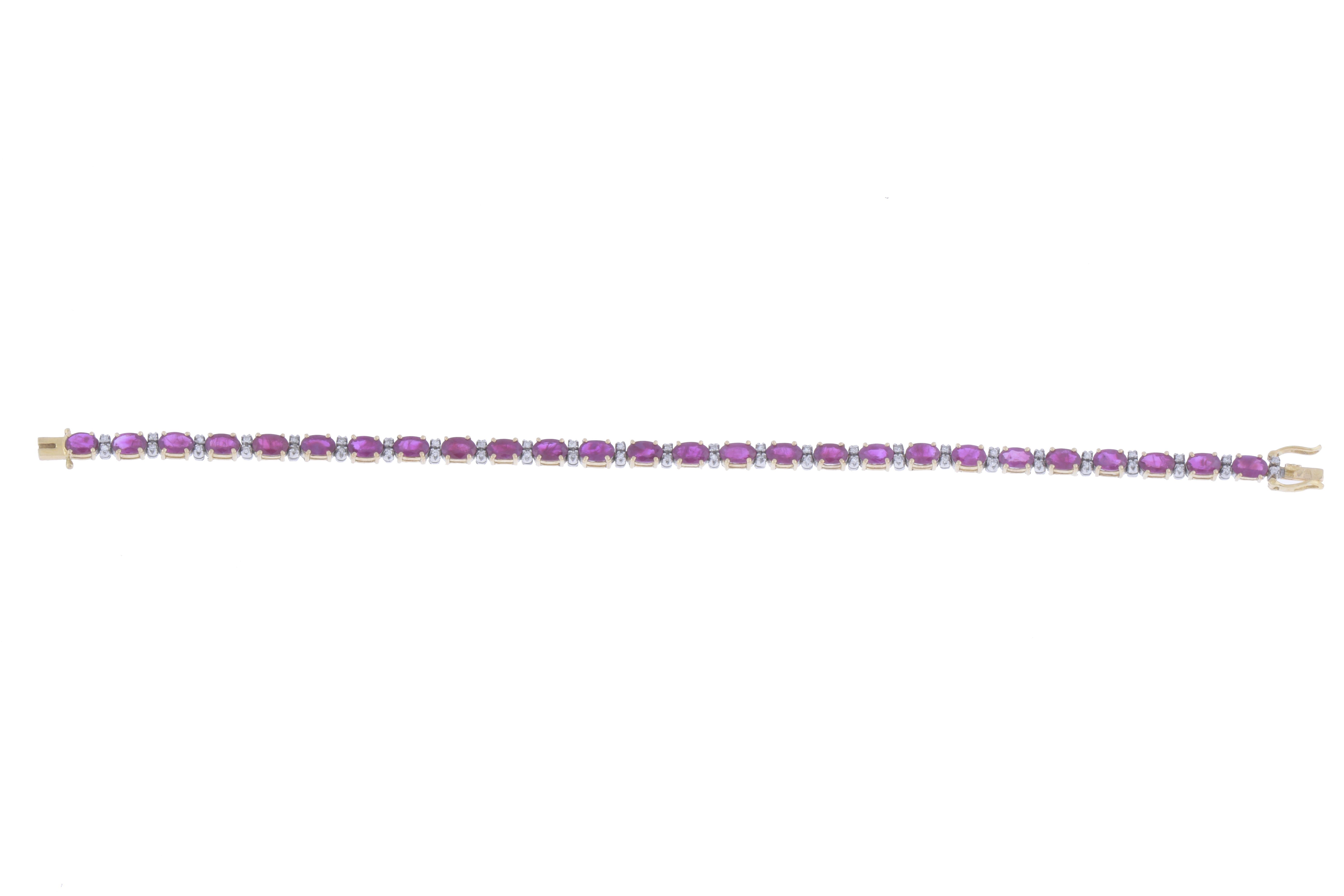 RIVIÈRE BRACELET WITH RUBIES AND DIAMONDS.