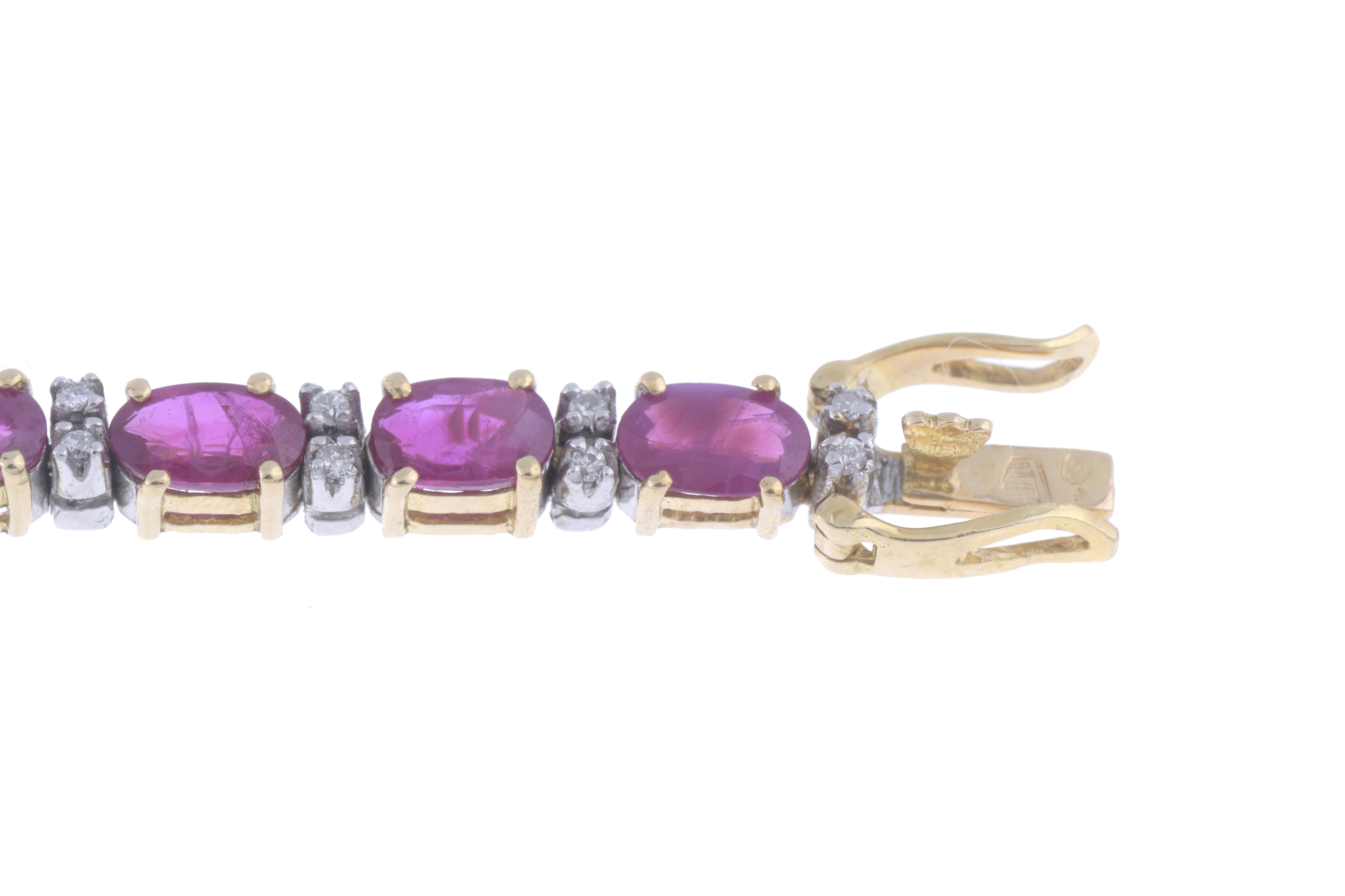 RIVIÈRE BRACELET WITH RUBIES AND DIAMONDS.