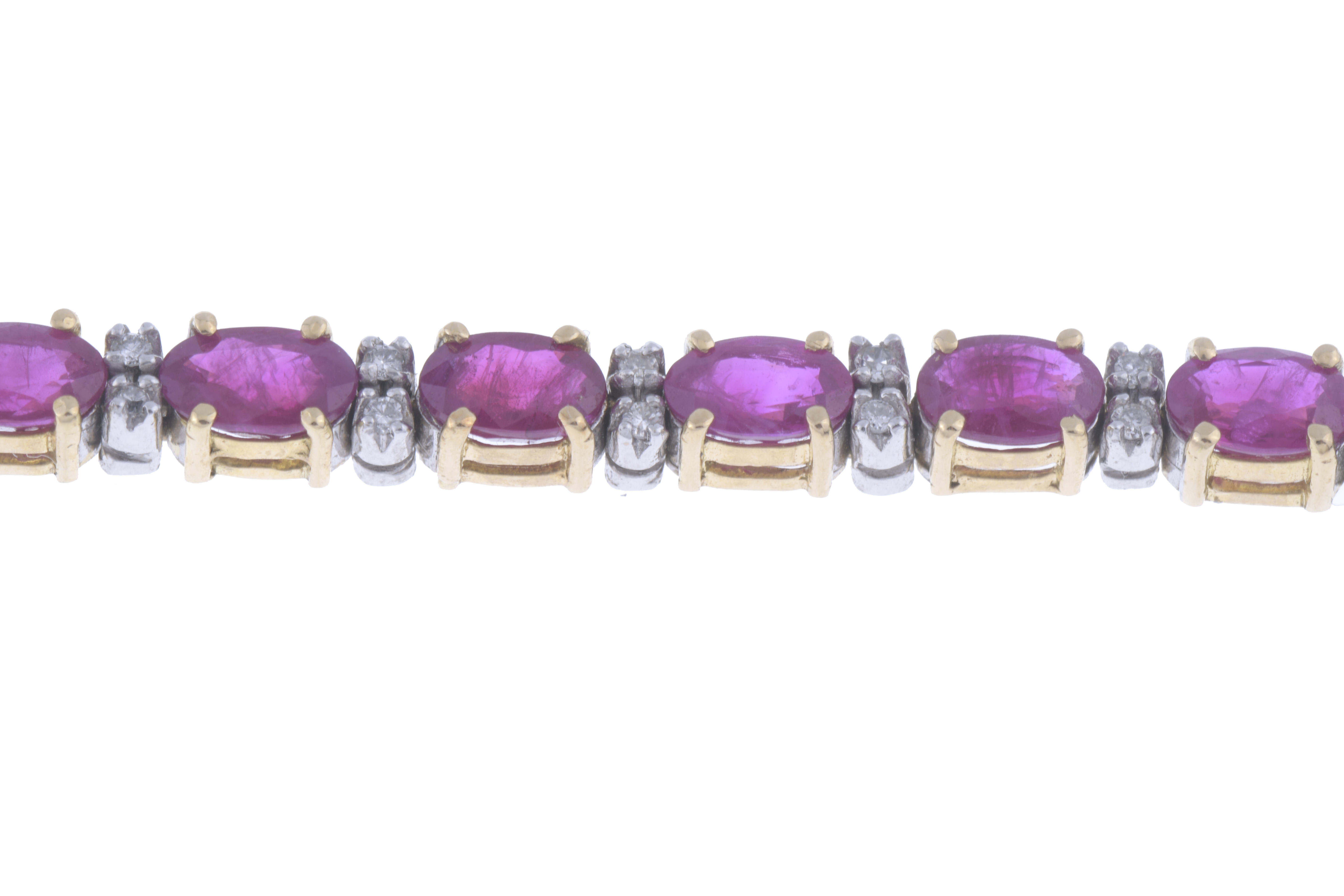 RIVIÈRE BRACELET WITH RUBIES AND DIAMONDS.