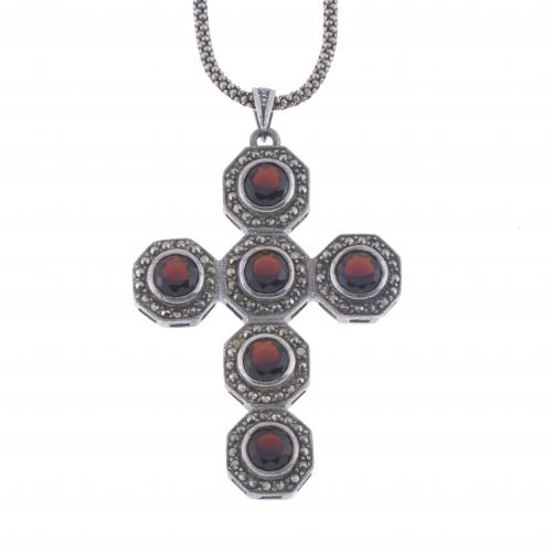 PENDANT WITH A LARGE CROSS.