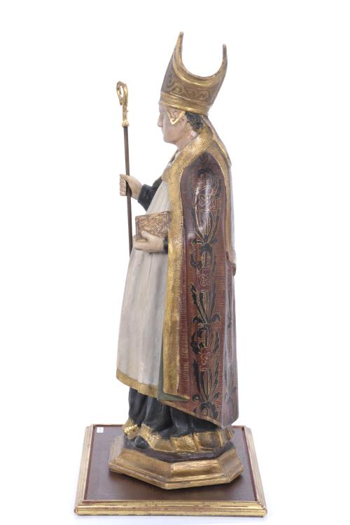 19TH CENTURY, SPANISH SCHOOL. CARVING OF A BISHOP WITH A BO