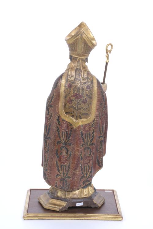 19TH CENTURY, SPANISH SCHOOL. CARVING OF A BISHOP WITH A BO