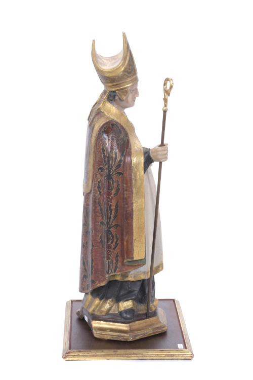 19TH CENTURY, SPANISH SCHOOL. CARVING OF A BISHOP WITH A BO