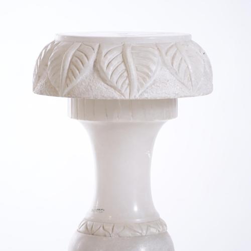 PAIR OF ALABASTER COLUMNS WITH ORIENTAL MOTIFS.