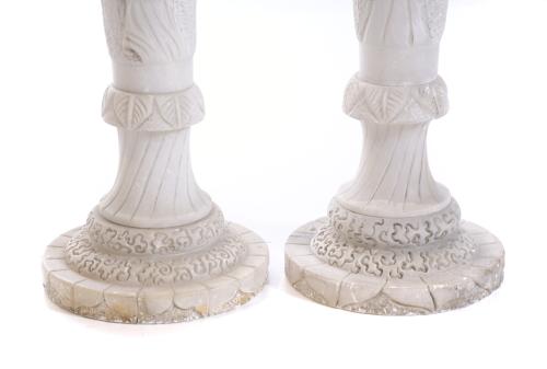 PAIR OF ALABASTER COLUMNS WITH ORIENTAL MOTIFS.