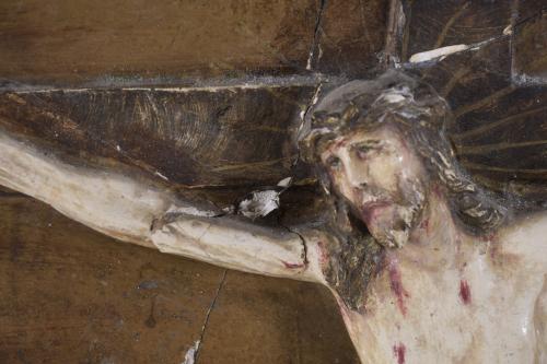 EMBOSSED PANEL DEPICTING CHRIST ON THE CROSS.