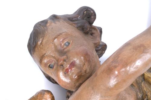 PAIR OF PUTTI IN POLYCHROME CARVING, MID 20TH CENTURY.