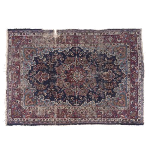 600-PERSIAN CARPET IN REDDISH AND BLUISH TONES.