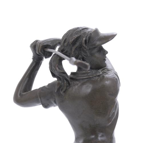 GOLF PLAYER SCULPTURE.